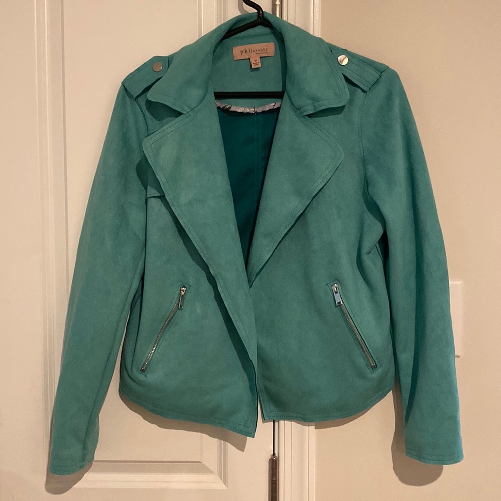 Faux leather blazer. Super soft and loose fit. Gorgeous accents.